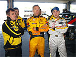 Drivers Tom Coronel (in the middle) and Michal Matjovsk are studying the results of the free practice sessions